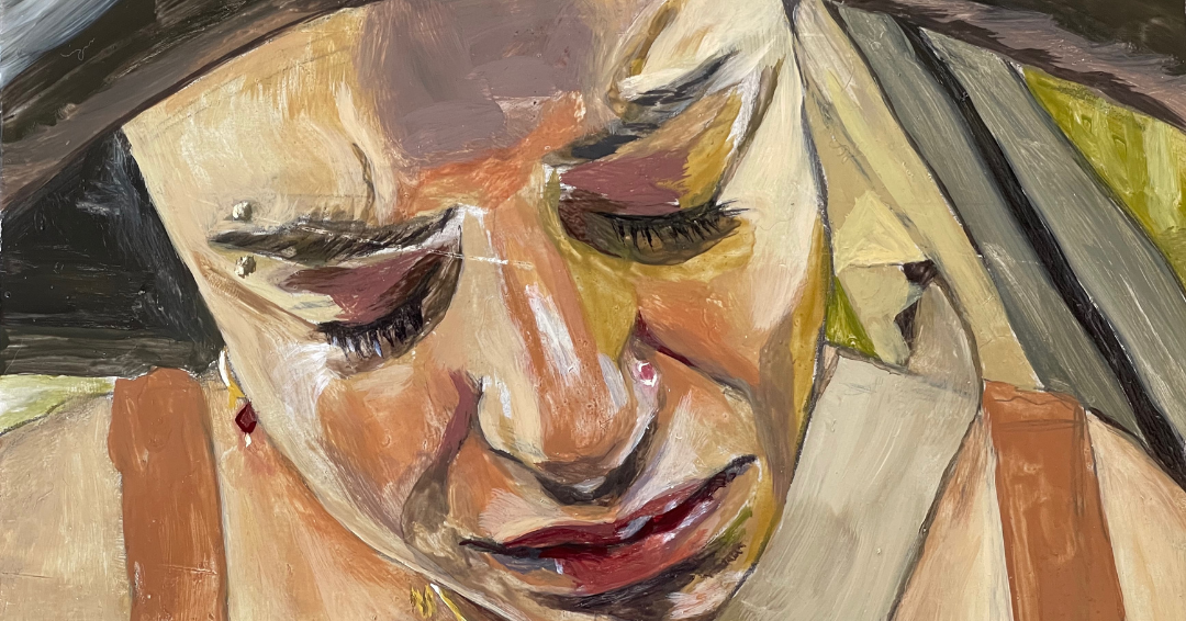 A femme-presenting person slumped over in her car with a sad expression. 