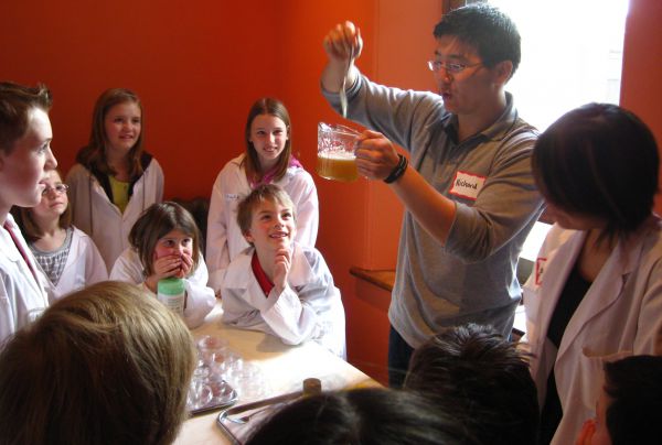 Kids watching experiment during March Break program