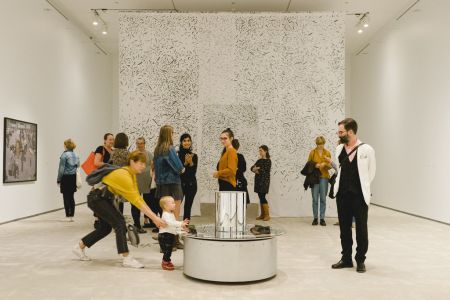 Visitors enjoy "The hold: movements in the contemporary collection." Visitors enjoy The hold: movements in the contemporary collection.