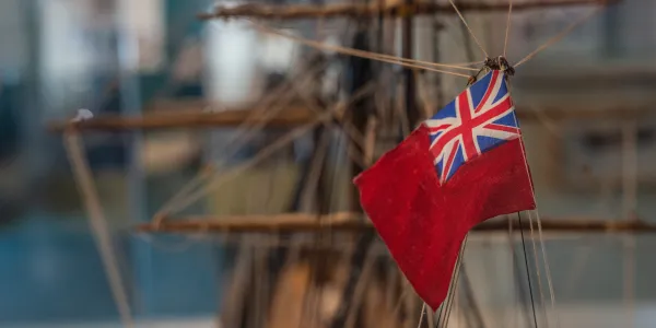 model ship flag focus photo credit: Wing Studios