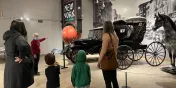 Visitors taking a Guided Tour of the Brockville Museum in Brockville, Ontario